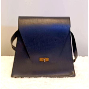 Vintage Leather Asymmetrical Purse With Front Snap made of Black Thick Leather
